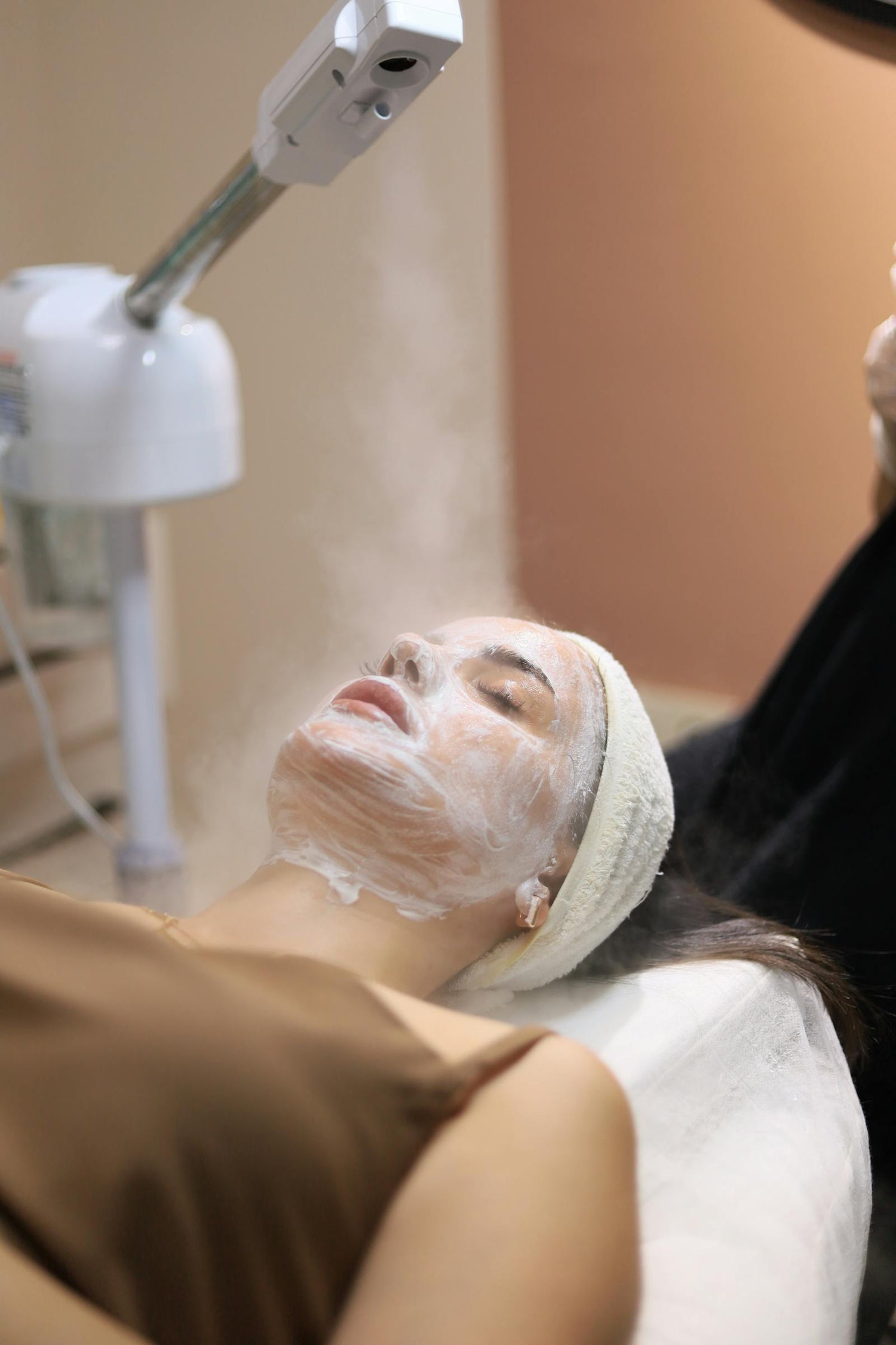 Woman enjoying facial steam